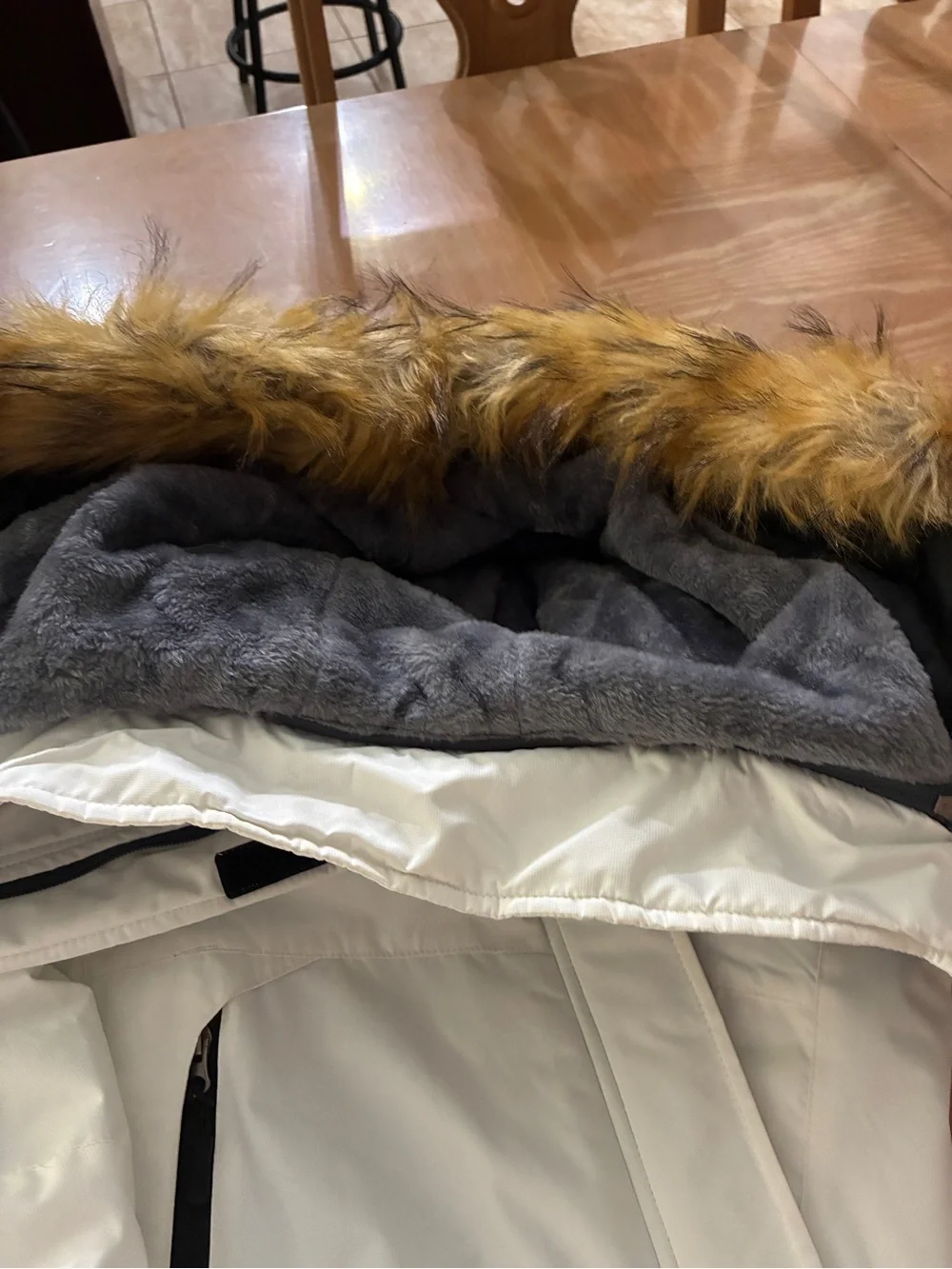 Two-Tone White and Black Winter Jacket with Faux Fur Hood